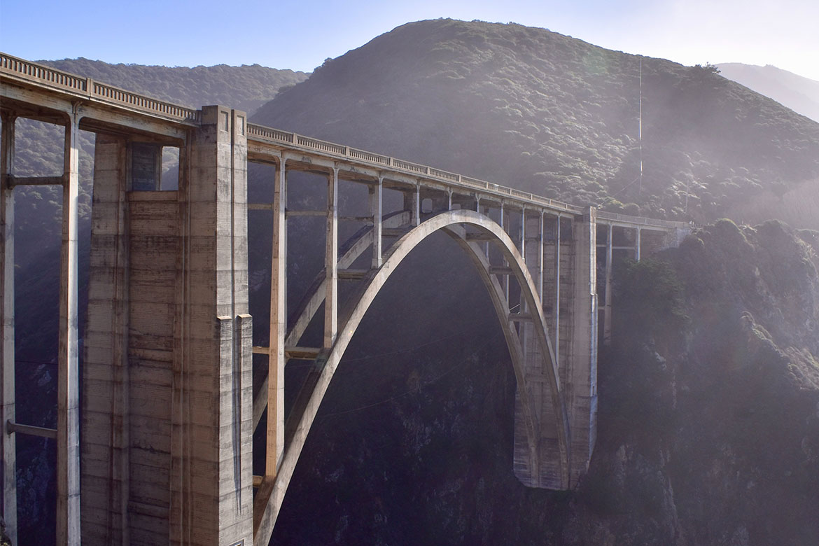 A bridge that shows how Contexture metaphorically connects data between our cloud app and our clients' financial system.